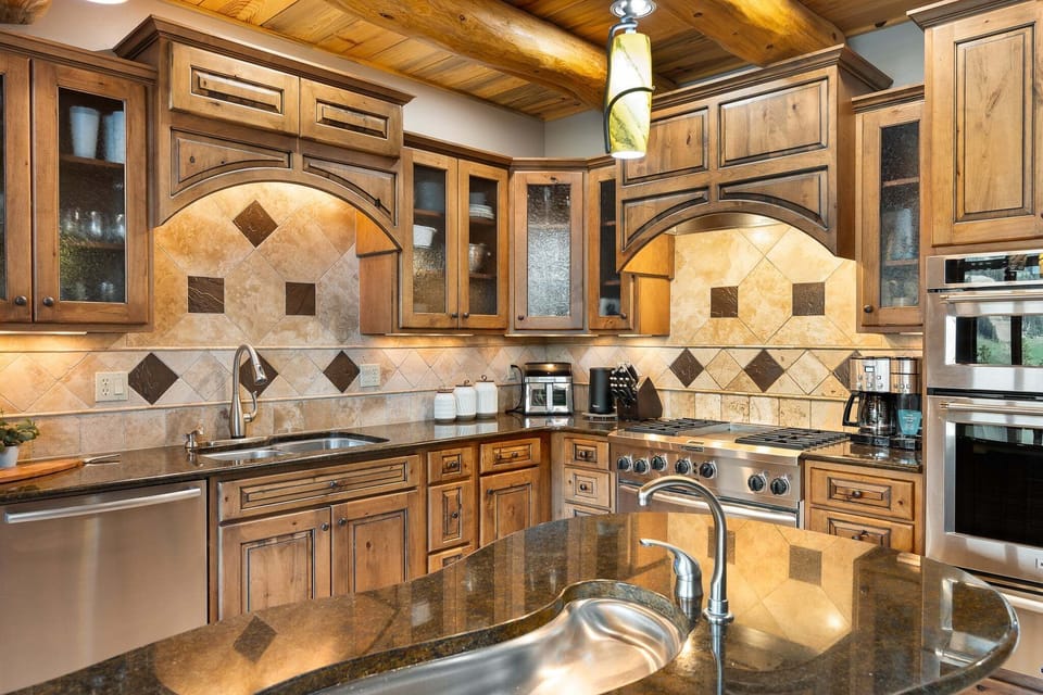 Spacious kitchen featuring a stainless steel gas stove