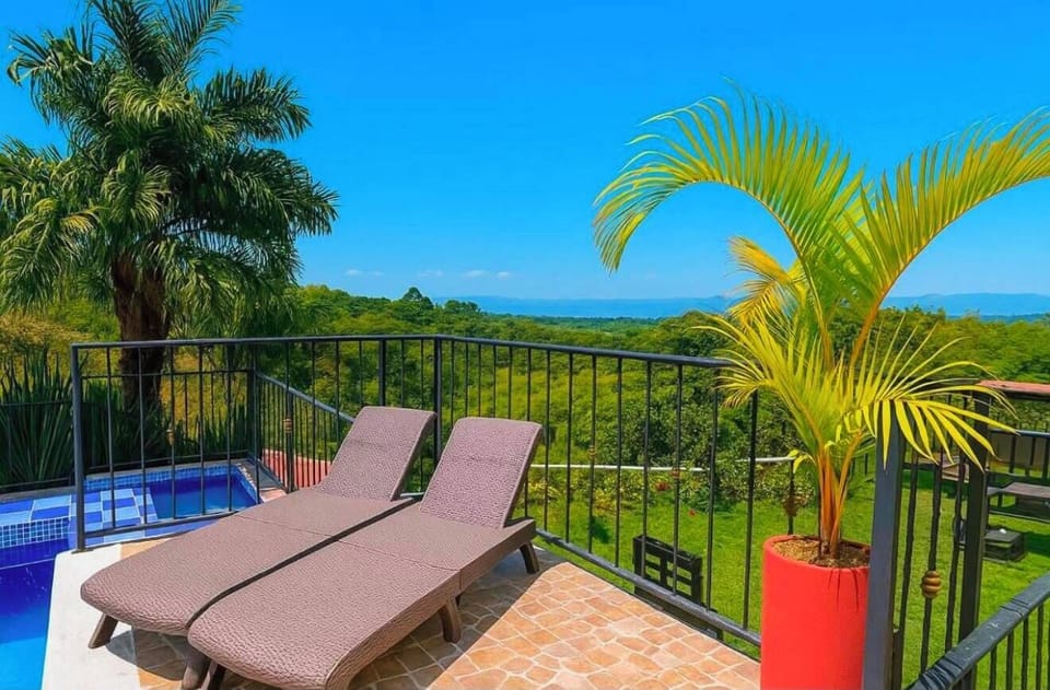 Basic Quadruple Room, Pool View | Property grounds