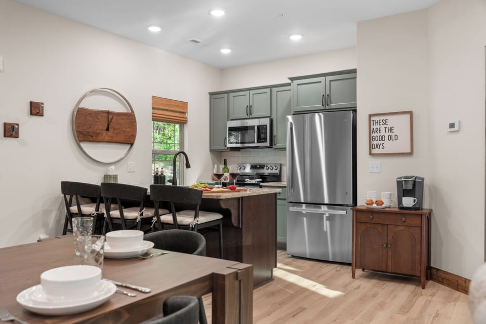 The fully-stocked kitchen is connected to the dining area and living area so that even when preparing meals everyone is together.