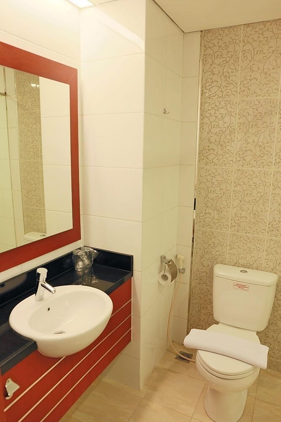 Shower, hair dryer, slippers, towels
