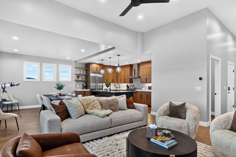 Open-concept main level seamlessly connecting the living room and kitchen, ideal for entertaining.