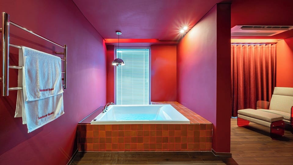 Superior Room, Ocean View | Bathroom | Separate tub and shower, deep soaking tub, hair dryer, bathrobes