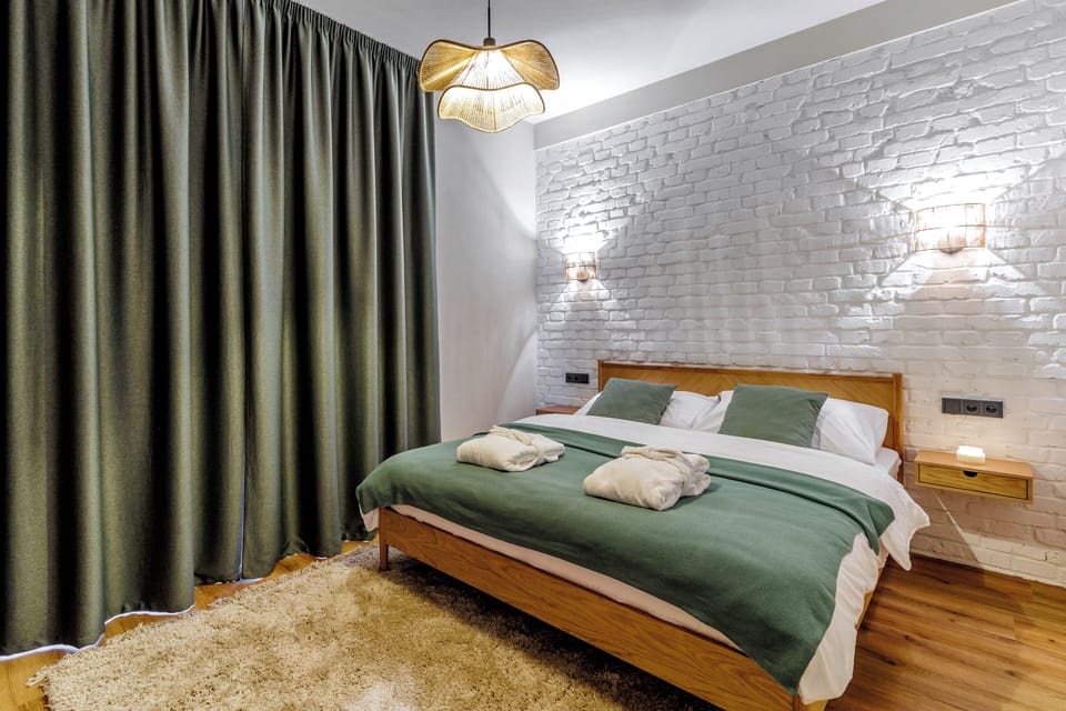 Deluxe Apartment, Balcony, Garden View (BOHO) | In-room safe, desk, laptop workspace, blackout drapes
