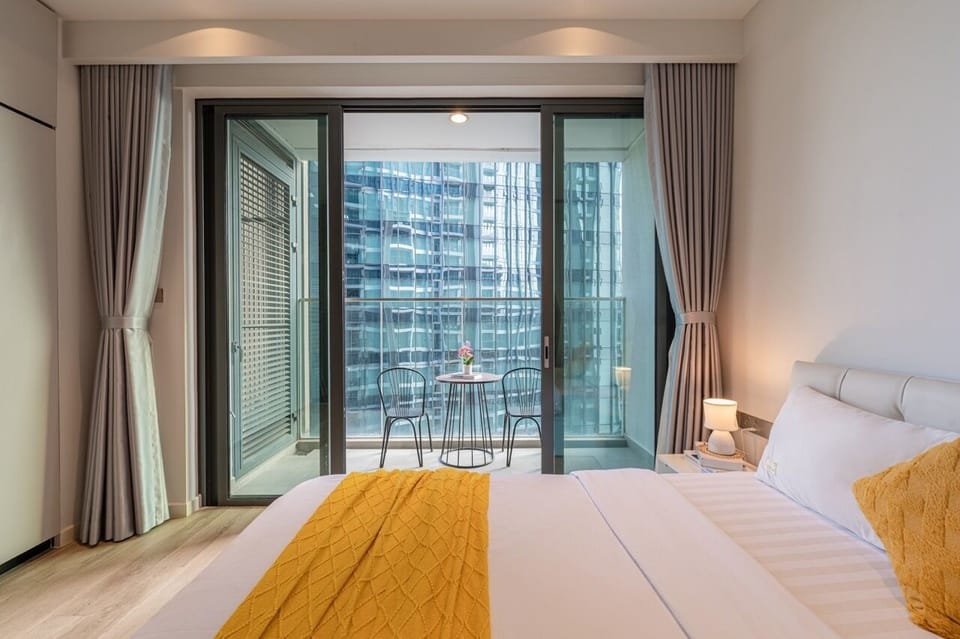 Deluxe Apartment, 1 Bedroom, City View | Desk, laptop workspace, blackout drapes, soundproofing