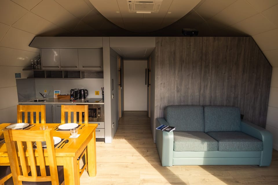 Living, dining, and kitchen area