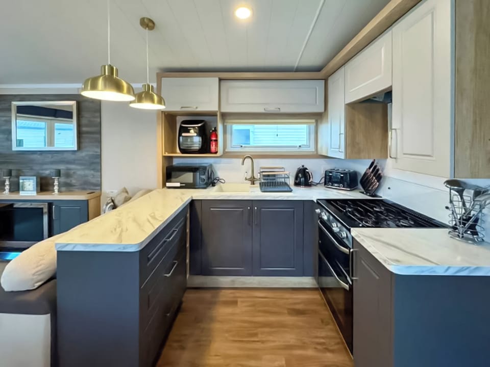 Kitchen | Swift Bordeaux Escape - North Wales Holidays, Towyn