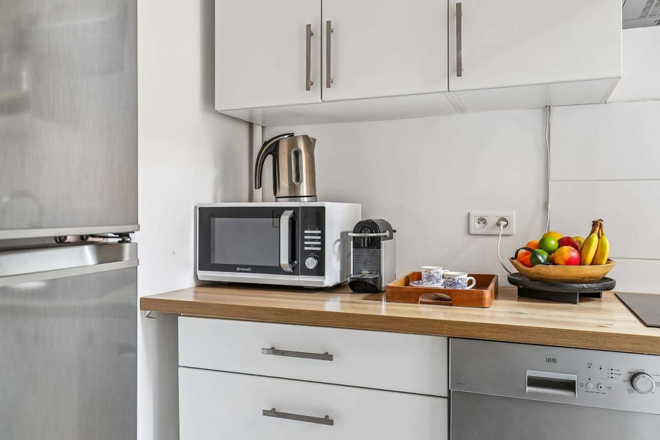 The kitchen is fully equipped to prepare a simple meal 