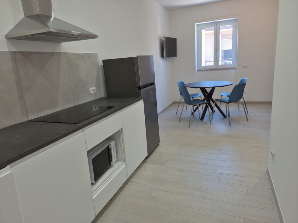 Comfort Apartment | Private kitchen | Fridge, stovetop, dishwasher, highchair