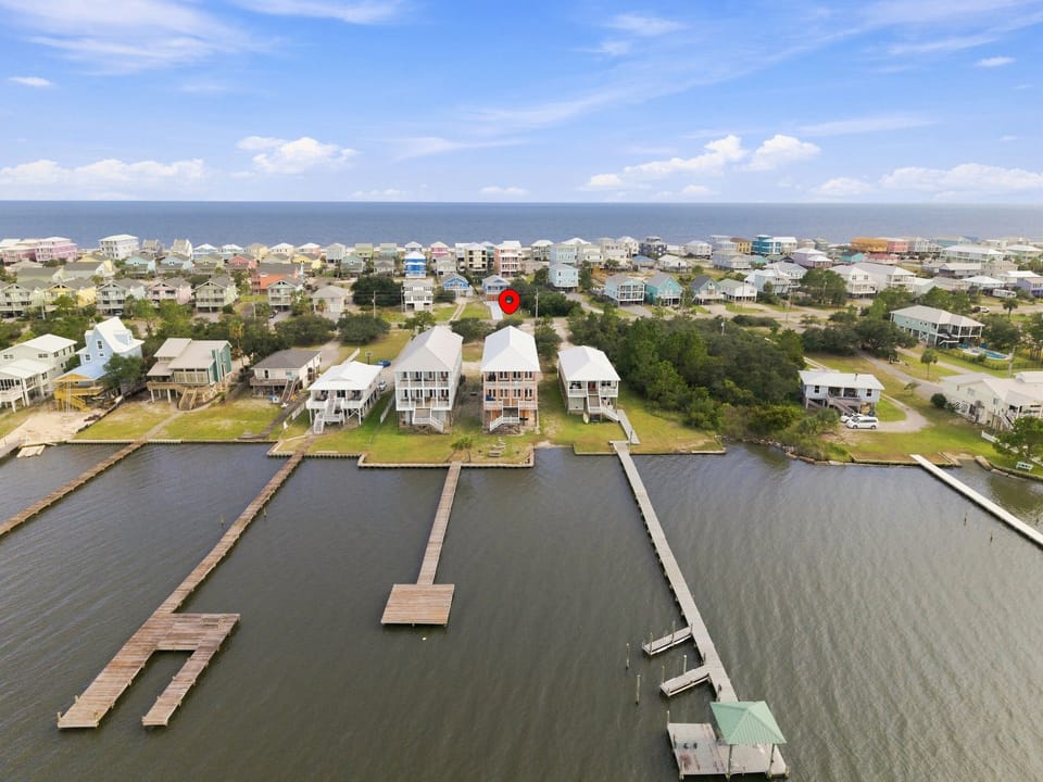 Aerial of the lagoon shoreline lined with private docks