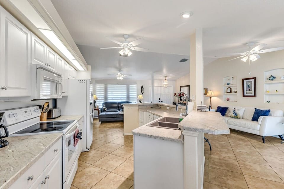 Kitchen | Electric Range | Open Layout to Living Room