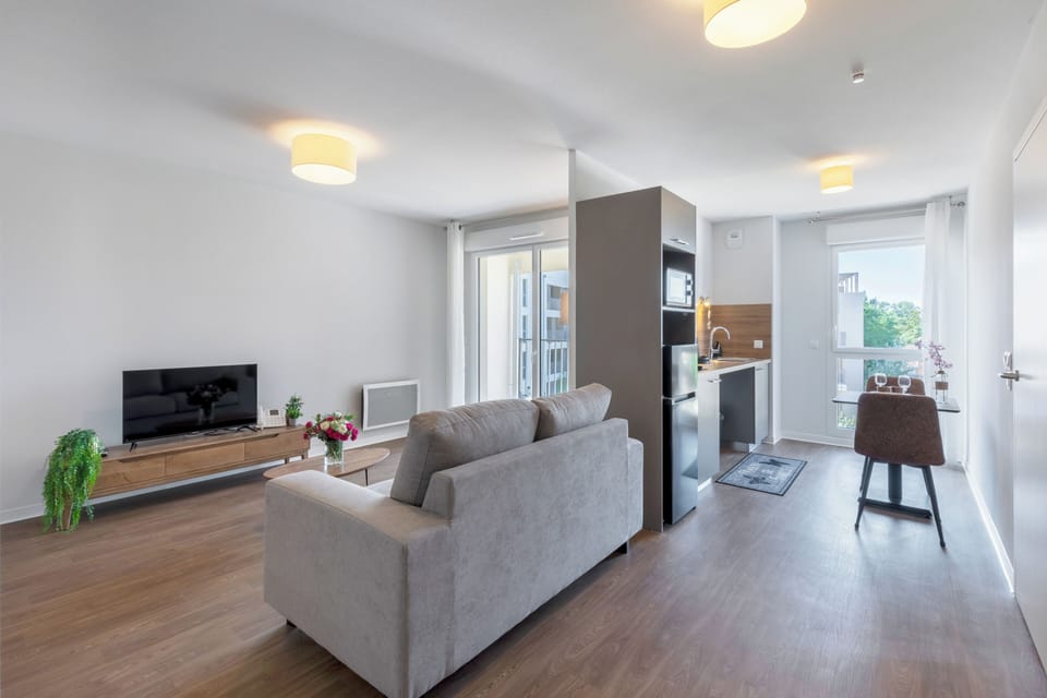 Superior Apartment, 1 Bedroom, Balcony | Living area | 32-inch flat-screen TV with digital channels