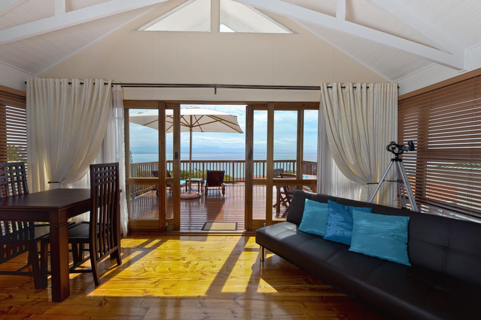 Honeymoon Suite, Sea View, Sea Facing | Living area | Flat-screen TV