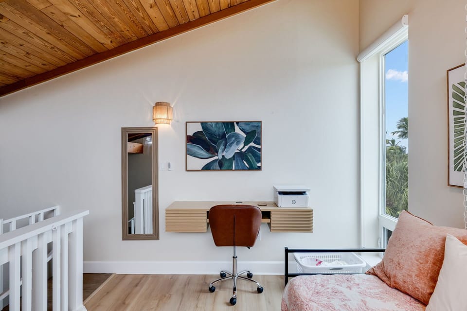 Loft with two single beds and desk