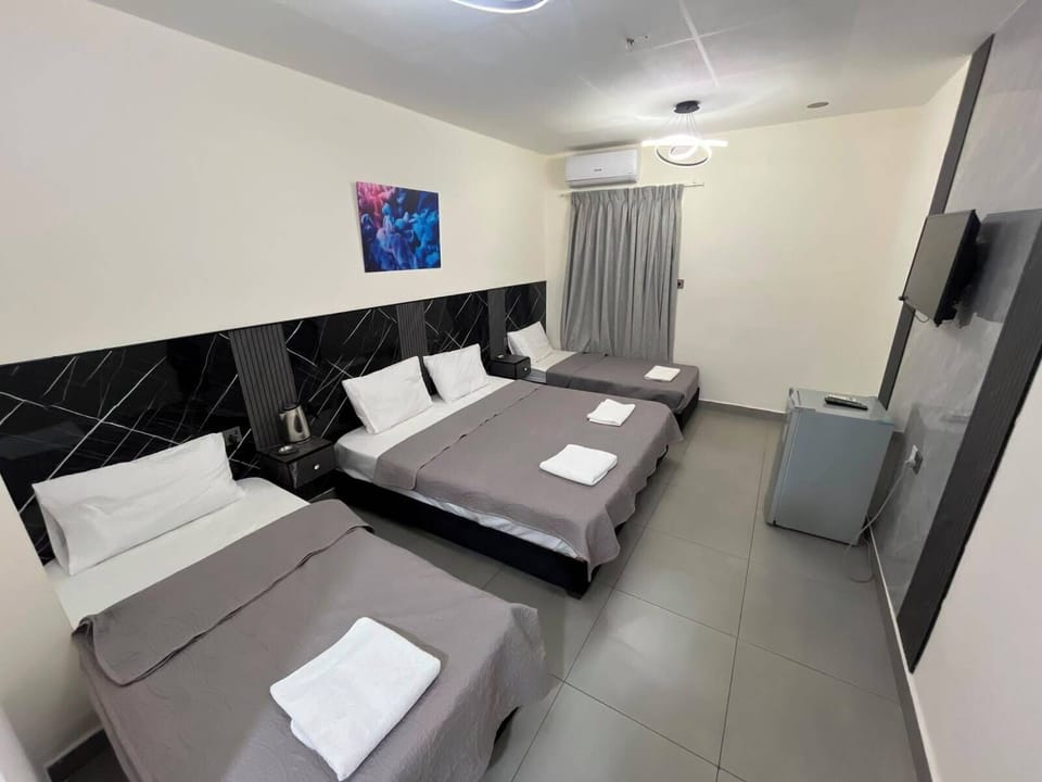 Basic Quadruple Room | In-room safe, blackout drapes, soundproofing