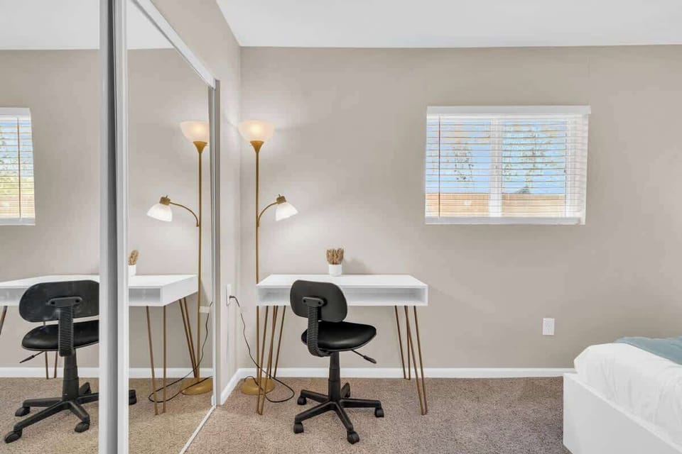 Work remotely in the queen bedroom.
