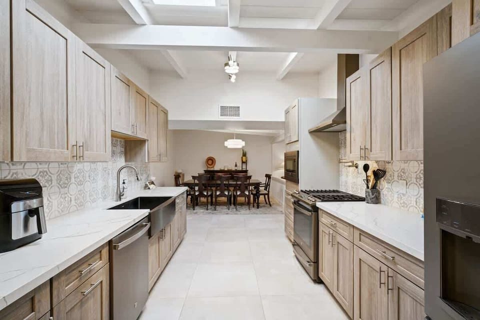 Newly renovated kitchen equipped with appliances. 