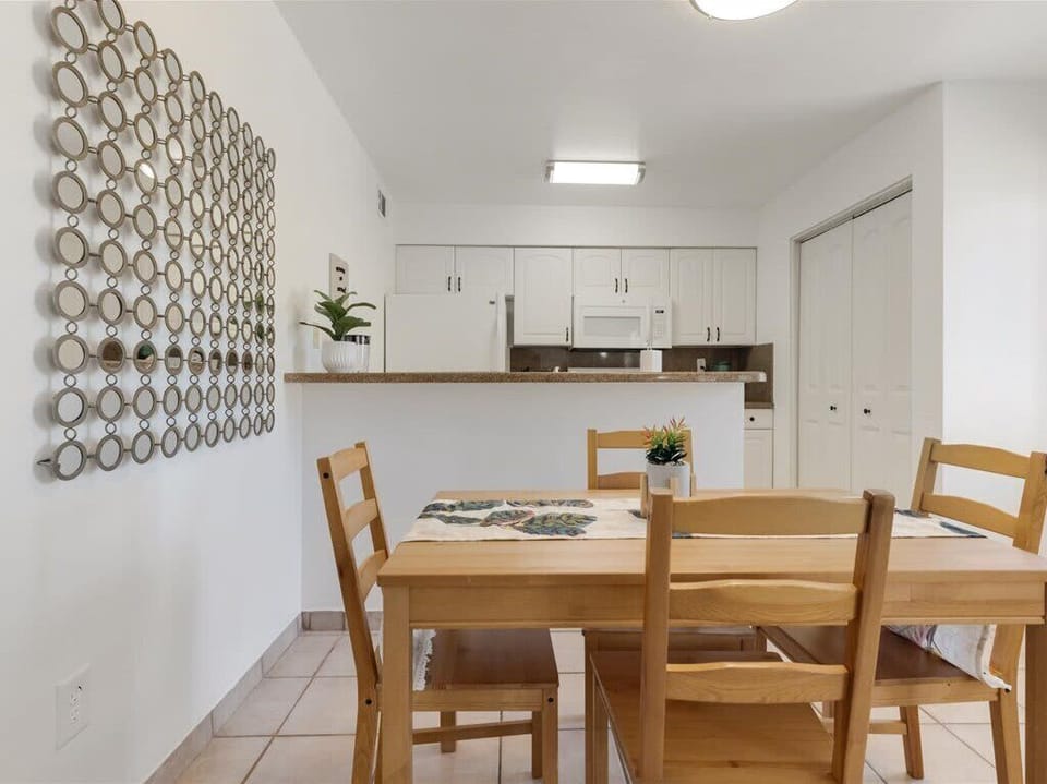 Unique dining area with mirror.