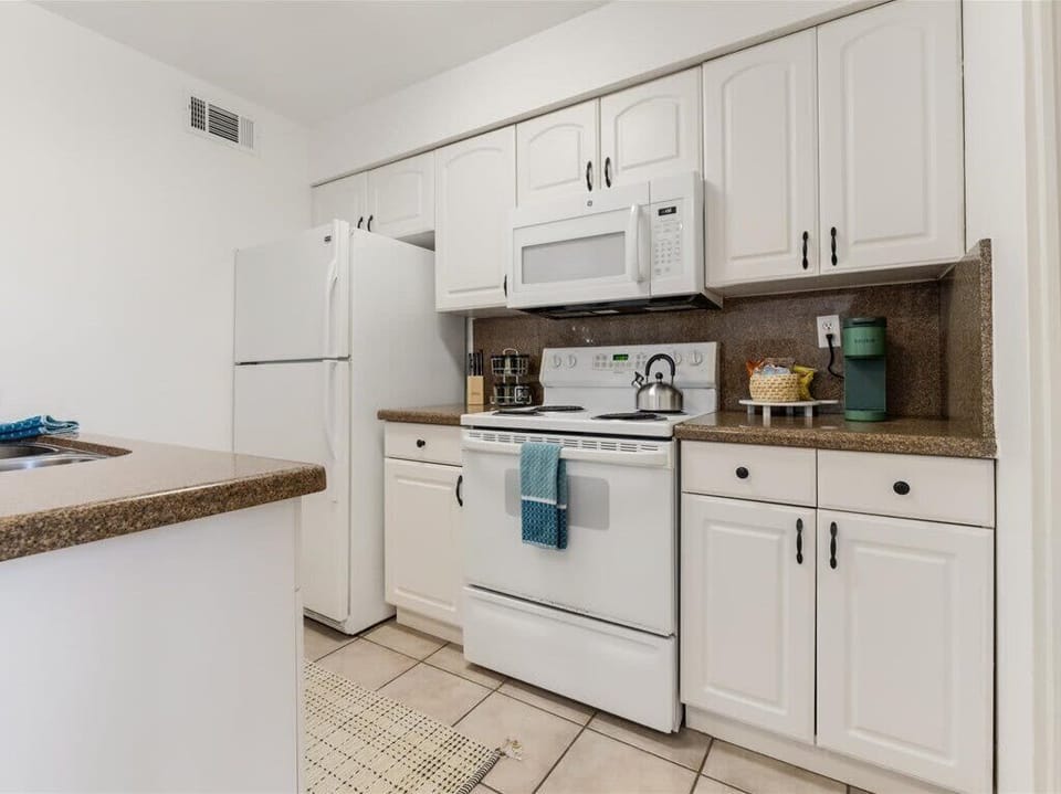 Well stocked kitchen with snacks and coffee