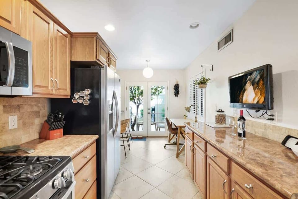 Spacious kitchen with 25" TV.