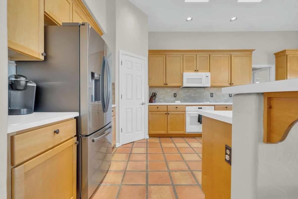 Kitchen with coffee amenities.