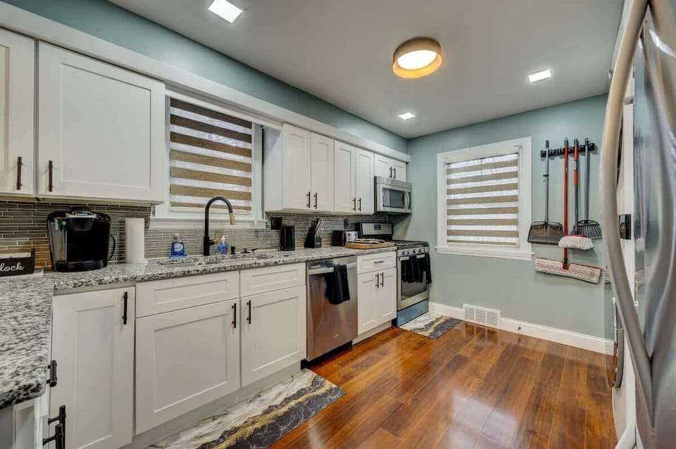 Wide kitchen view w/ clean design, plenty of storage & open floor plan
