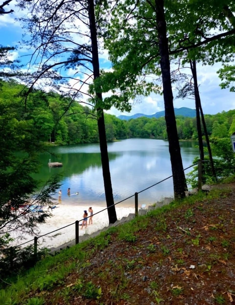 walkway from covered pavilion with picnic tables and bathrooms down to beach. Minutes from cabin. Open year round 