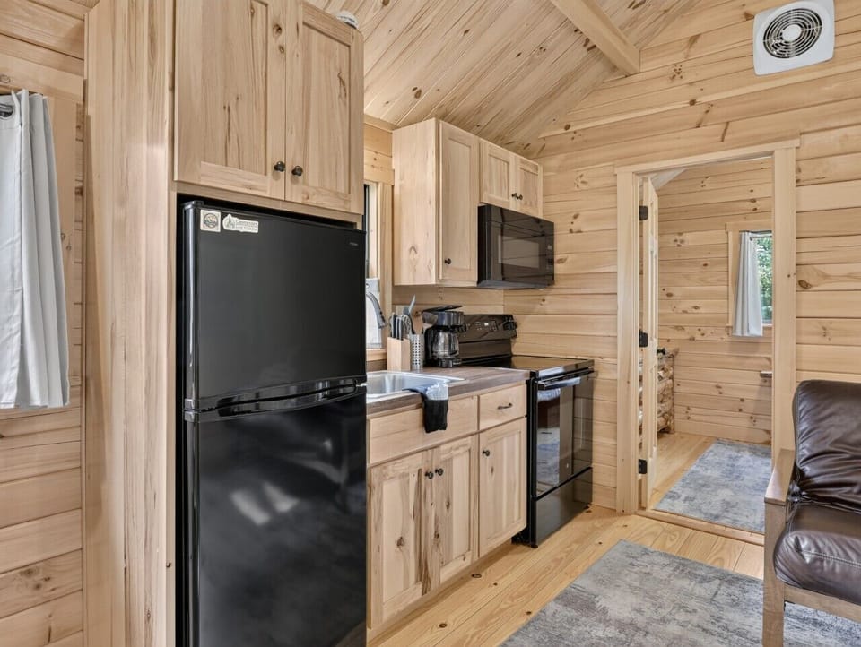 Kitchen | Electric Range & Coffee Station | Full-Size Refrigerator