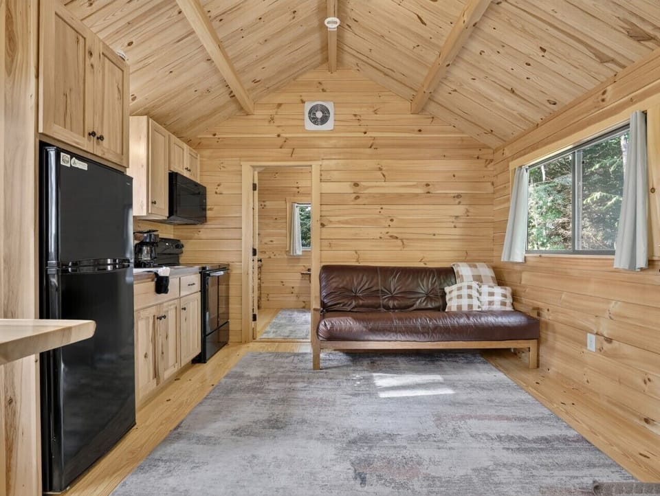 Living Room | Sectional Sofa | Wood Paneling & Natural Light