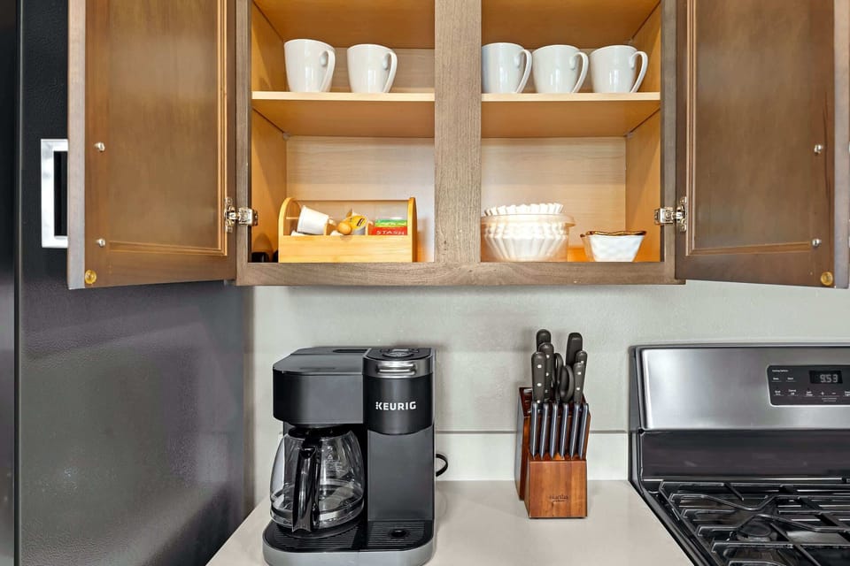 Start your morning at the stocked coffee station with a Keurig and drip brewer.