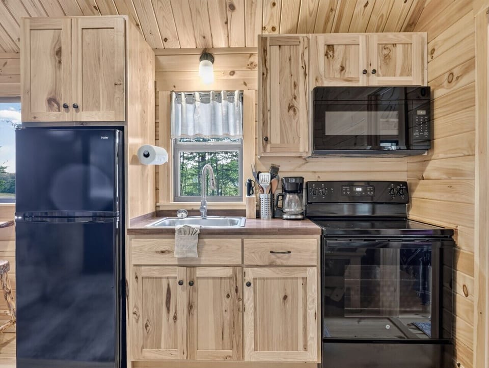 Kitchen | Electric Range & Coffee Station | Full-Size Refrigerator