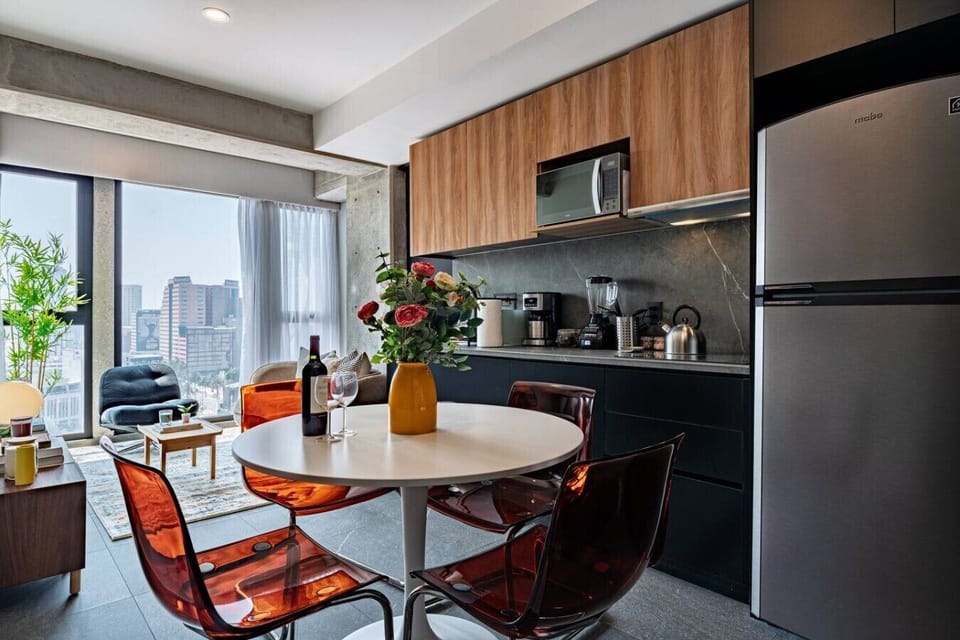 Prepare meals and gather together in the modern kitchen and dining area.