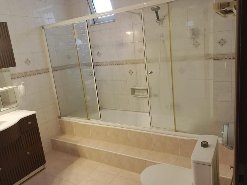 Economy Triple Room, City View | Bathroom | Shower, free toiletries, hair dryer, slippers