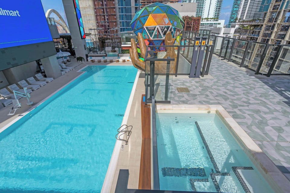 Recharge in the upper-level spas or grab a cabana & cool off in the shade​