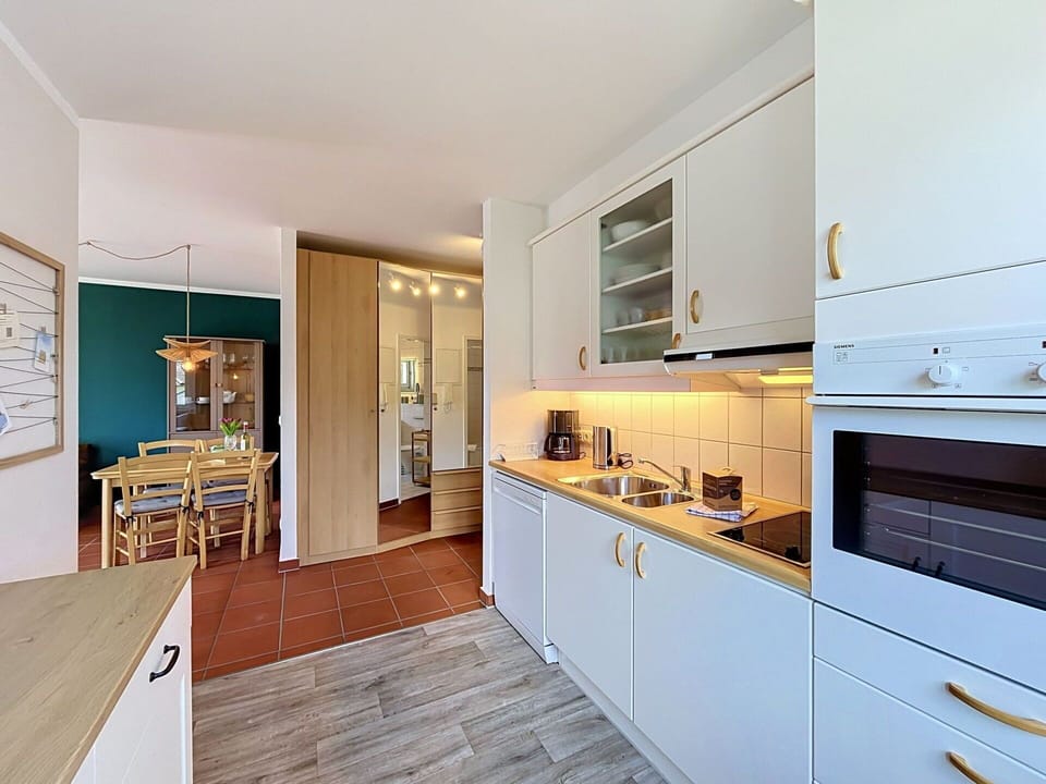 Interior Design, Kitchen, Flooring, Countertop, Wood, Floor, Ceiling, Cabinetry, Kitchen Appliance, Furniture
