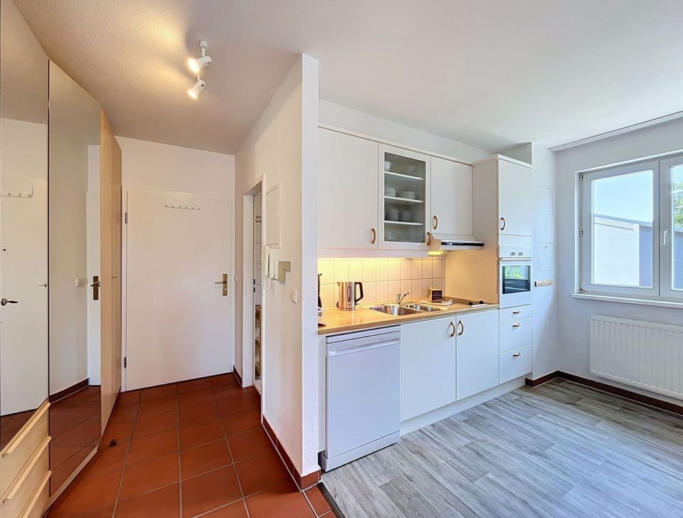 Interior Design, Flooring, Apartment, Floor, Room, Home, Ceiling, Kitchen, Cabinetry, Countertop