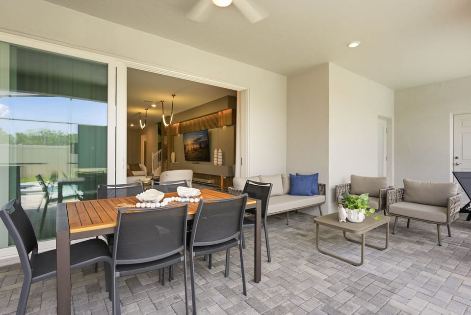 Outdoor patio with private pool and summer kitchen