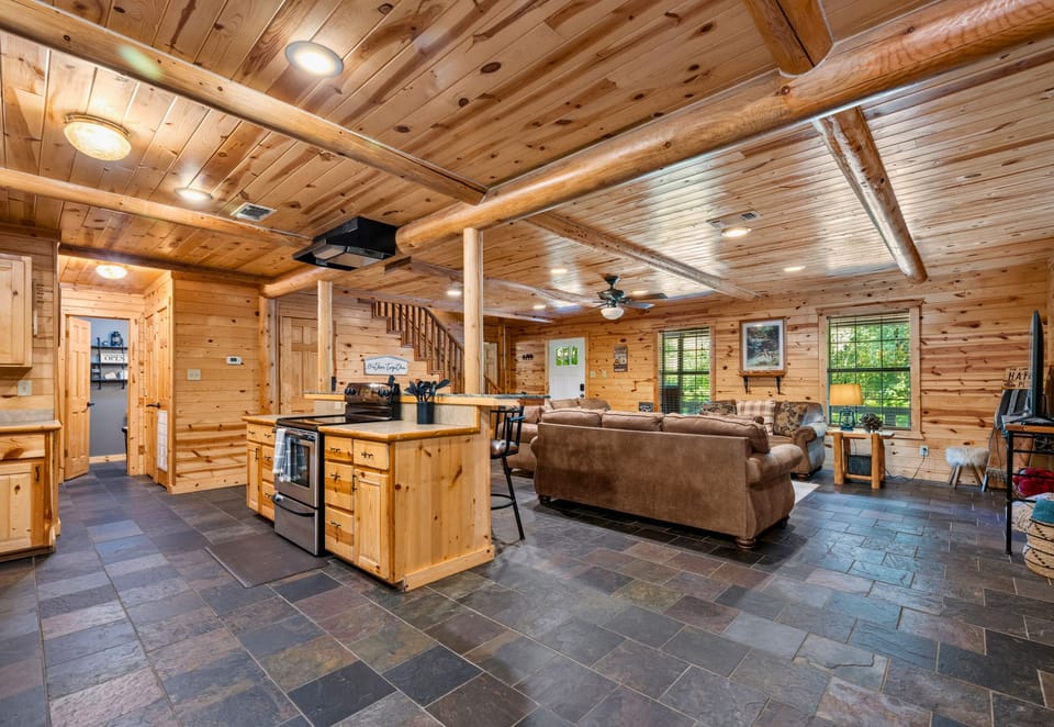 The open layout allows everyone to gather comfortably, whether you're cooking, visiting, or planning the day's adventures around Broken Bow.