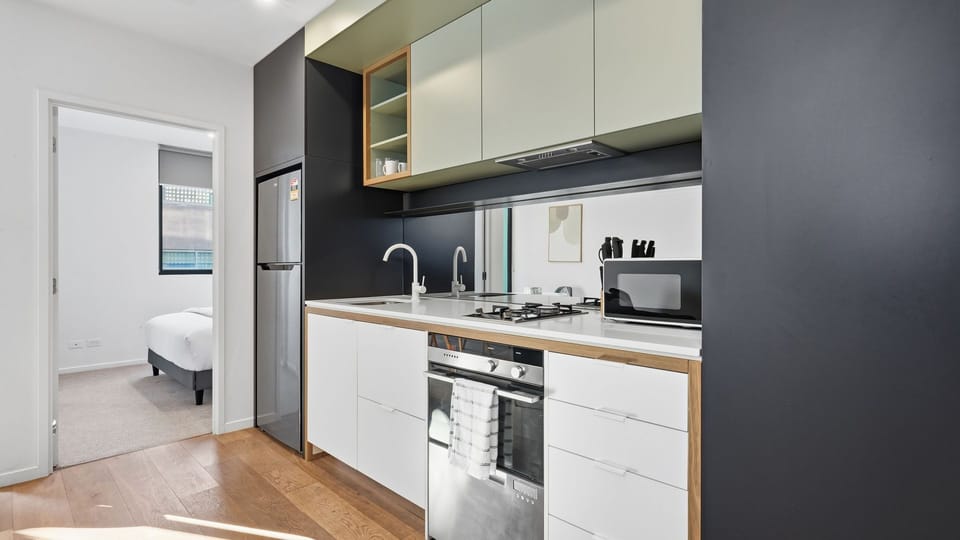 A contemporary kitchen equipped with modern appliances makes every meal effortless.