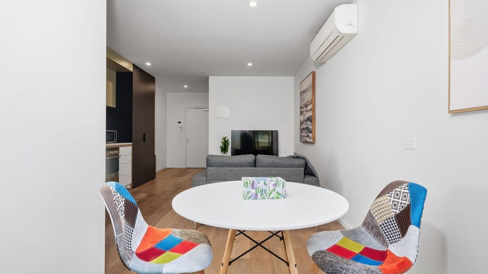 Share breakfast, coffee, or a casual meal around the cheerful dining table.
