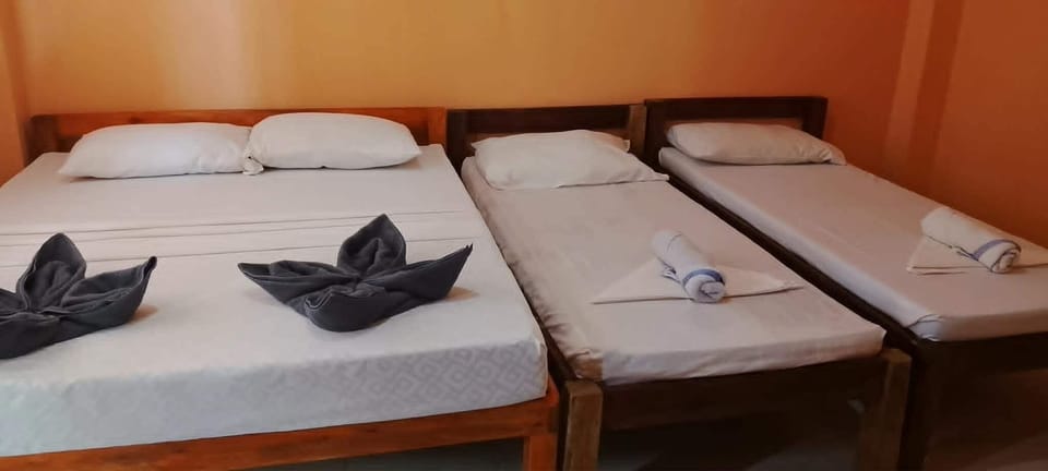 Family Quadruple Room, Balcony, Garden View | Bed sheets