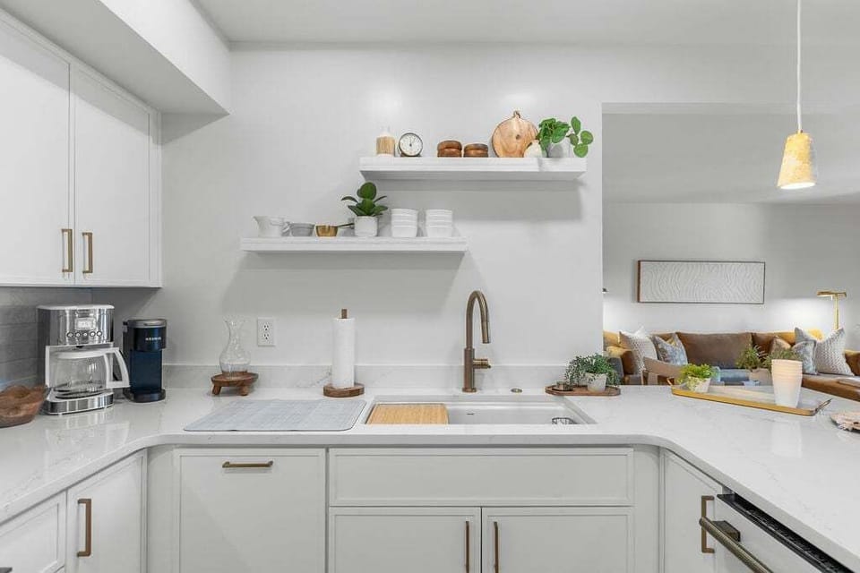 Kitchen has all the essential cookware and small appliances needed to prepare meals with ease.