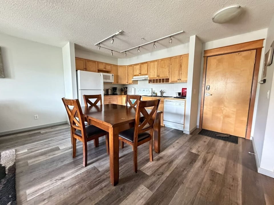 Dining table comfortably seats 4 guests