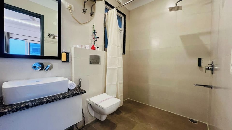 Basic Double or Twin Room | Bathroom | Shower, free toiletries, towels, soap