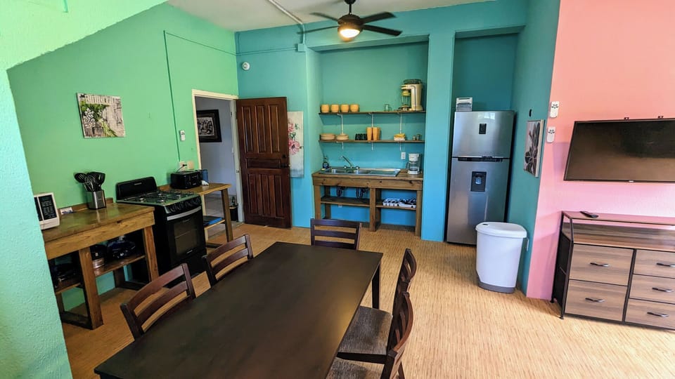 A Caribbean style kitchen - fully equipped with blenders, margarita machines, air fryer, Instapot (tm)... Ready for some cooking!