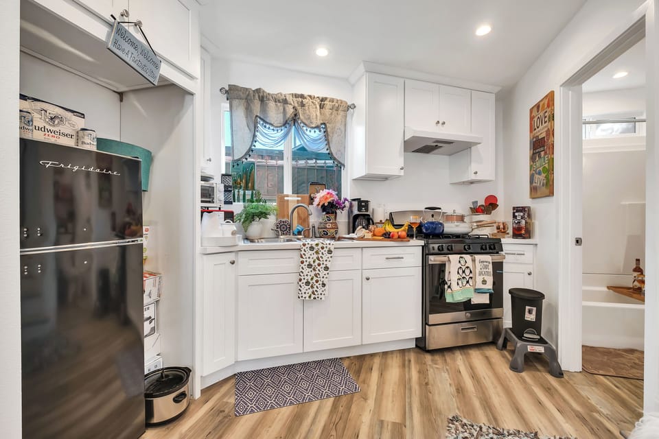 Kitchen is fully stocked with high-quality pots, pans, and all utensils