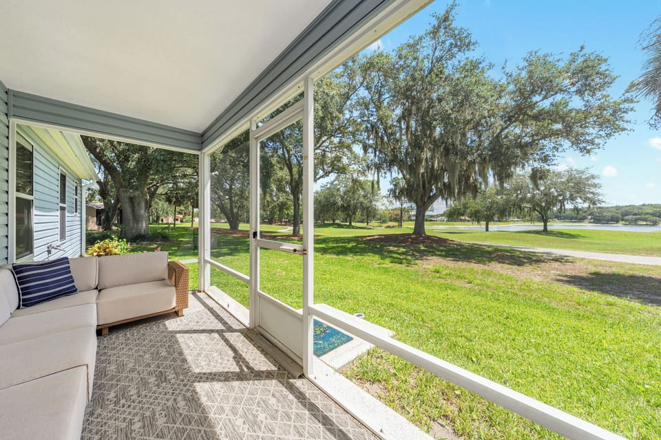 Drink Your Coffee in the Screened-in Lanai w/ Lounge Seating Overlooking the Serene Golf Course