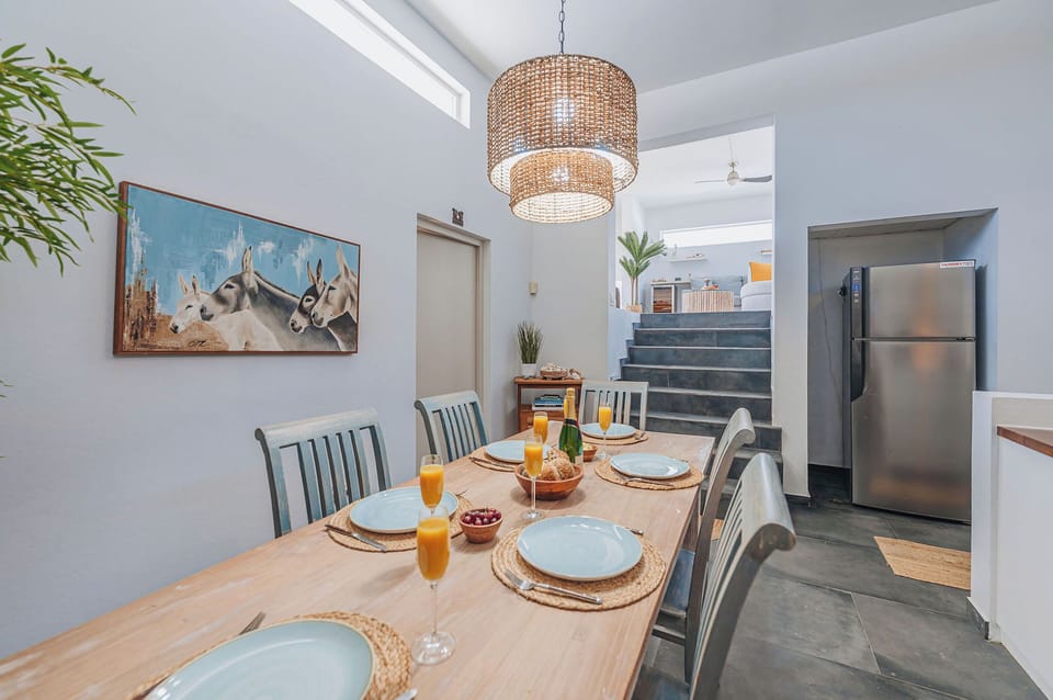 Gather around the welcoming dining table for relaxed breakfasts, family meals, and memorable evenings together.