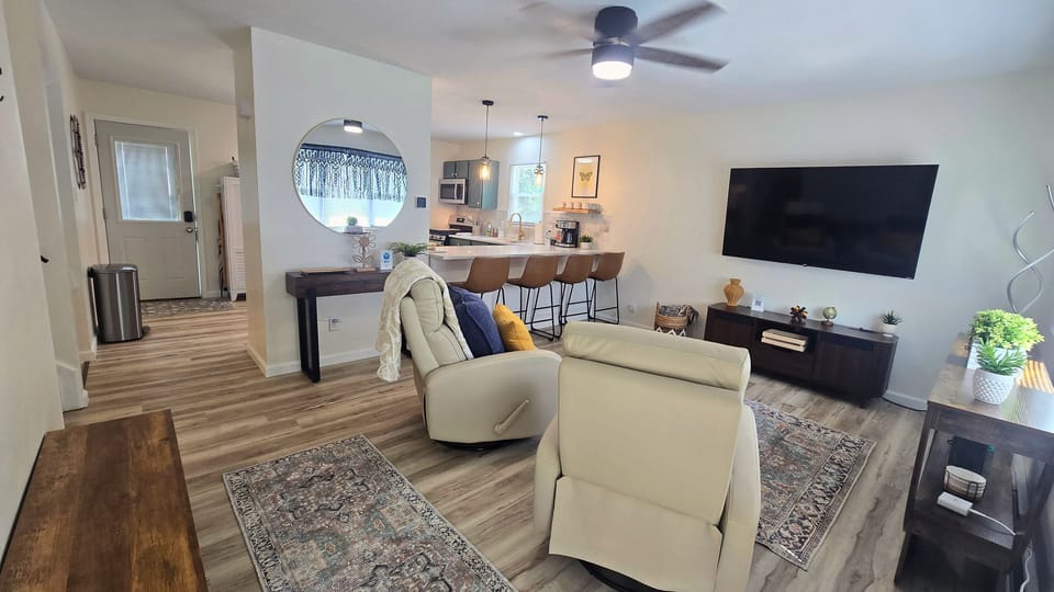 Relax in comfortable swivel recliners while the cook never misses the action.