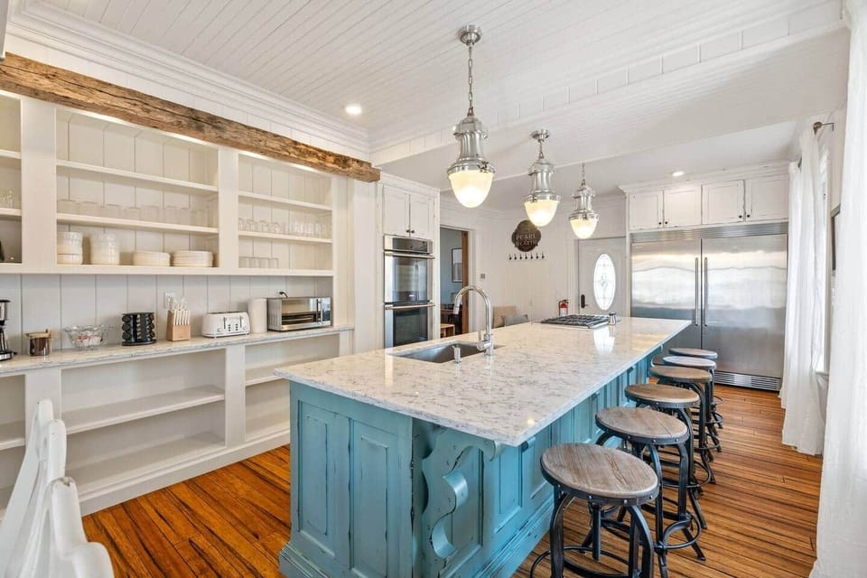 Whether you're preparing a family feast or uncorking a bottle from a local winery, the chef's kitchen offers premium appliances, generous prep space and room for everyone to gather around the island.