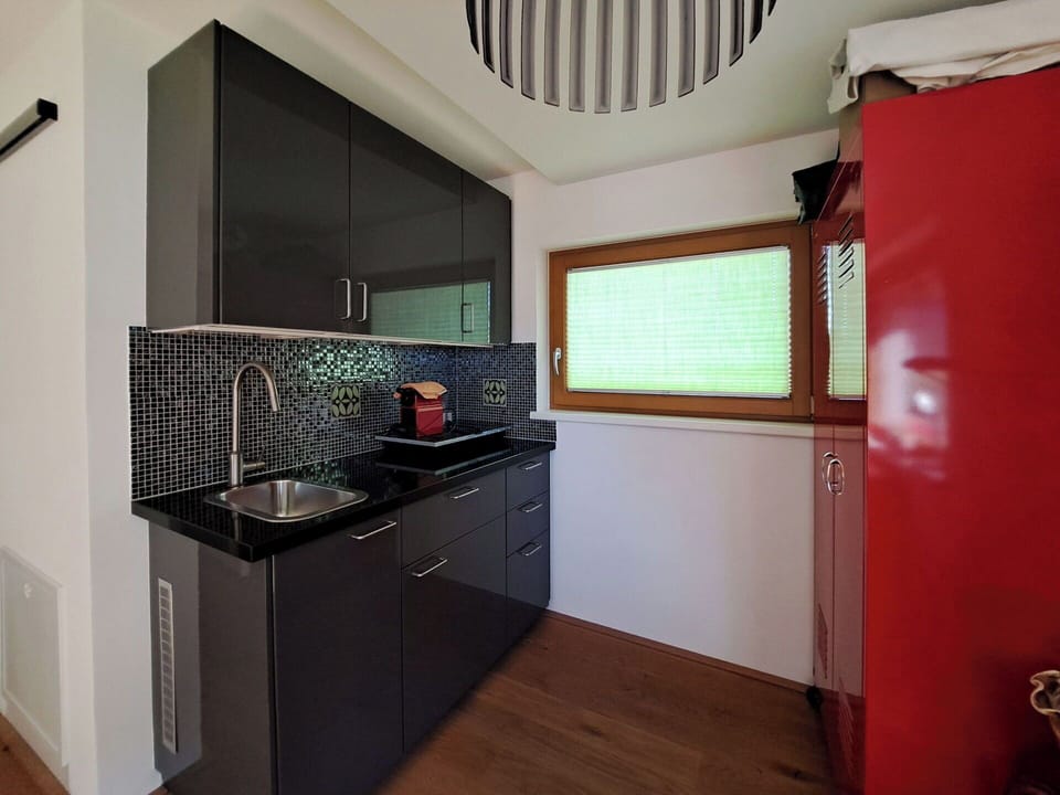 Kitchen, Interior Design, Wood, Countertop, Kitchen Appliance, Cabinetry, Flooring, Lighting, Major Appliance, Ceiling